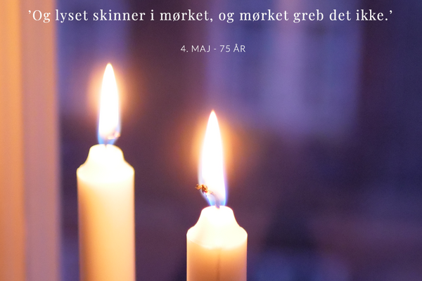 To levende lys i vindue